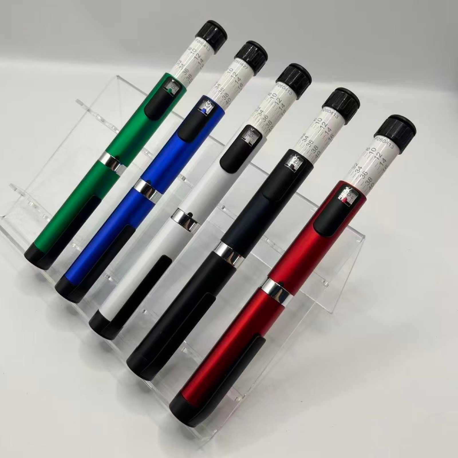 Reusable metal pen injector samples in customized colors