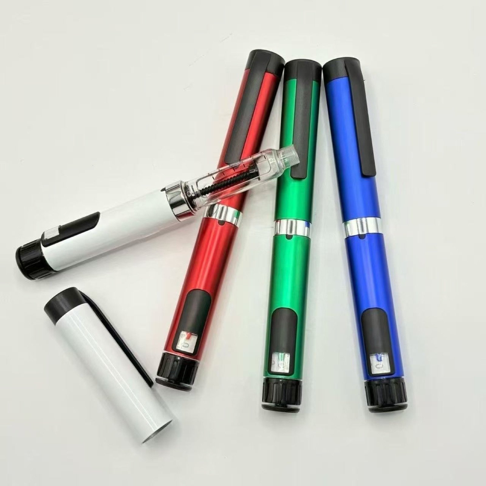 Metal pen injector samples with visible mechanism
